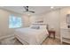 Well-lit bedroom features a ceiling fan, soft natural light and neutral tones at 515 34Th Ne Ave, St Petersburg, FL 33704