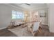 Comfortable living room featuring hardwood floors, neutral paint, contemporary furniture, and an open floor plan at 515 34Th Ne Ave, St Petersburg, FL 33704