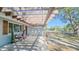 Inviting covered porch with stylish seating, creating a cozy outdoor living space at 515 34Th Ne Ave, St Petersburg, FL 33704