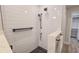 Stylish bathroom with a subway-tiled shower featuring dual shower heads and updated fixtures at 515 34Th Ne Ave, St Petersburg, FL 33704
