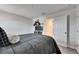 Cozy bedroom with neutral color palette, TV, and doorway to the other rooms of the home at 5402 Limelight Dr, Apollo Beach, FL 33572
