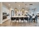 Bright kitchen features a large island, black hardware, modern appliances, and open layout at 5402 Limelight Dr, Apollo Beach, FL 33572