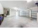 Large garage with multiple bays, offering plenty of space for parking and storage at 6002 Churchside Dr, Lithia, FL 33547