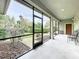 Relaxing screened lanai with views of the lush landscaping in this well-maintained home at 6002 Churchside Dr, Lithia, FL 33547