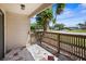 Charming porch features stylish tile work, sturdy wooden fence, and neighborhood views at 6361 23Rd N St, St Petersburg, FL 33702