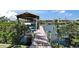 Dock with boat lift on the water at 6614 Blackfin Way, Apollo Beach, FL 33572