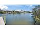 Waterfront homes with private boat docks on a sunny day showcasing beautiful waterfront living at 6614 Blackfin Way, Apollo Beach, FL 33572