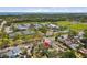 This aerial view shows the home's location near tennis courts, a park, and the waterfront at 711 19Th S Ave, St Petersburg, FL 33705