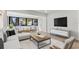 Bright living room with sleek furniture, large windows and light wood floors at 711 19Th S Ave, St Petersburg, FL 33705