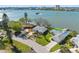 Prime waterfront homes and lush landscaping highlight this amazing aerial view of a serene coastal community at 7160 S Shore S Dr, South Pasadena, FL 33707