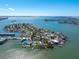 Expansive aerial view of waterfront houses with docks and panoramic bay views at 7160 S Shore S Dr, South Pasadena, FL 33707