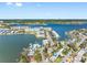 Stunning aerial shot of waterfront homes with docks and beautiful ocean views at 7160 S Shore S Dr, South Pasadena, FL 33707