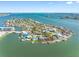 Waterfront neighborhood with backyard boat docks provides access to ocean, beaches, and downtown at 7160 S Shore S Dr, South Pasadena, FL 33707