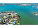 Overhead panorama capturing tranquil bay waters with waterfront homes, private docks, and boat access in a bayside community at 7160 S Shore S Dr, South Pasadena, FL 33707