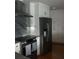 Gourmet kitchen featuring stainless steel appliances, and modern cabinetry at 731 Snug Is, Clearwater, FL 33767