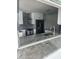 Gourmet kitchen featuring granite countertops, stainless steel appliances, and modern cabinetry at 731 Snug Is, Clearwater, FL 33767