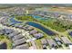Stunning aerial view of the neighborhood highlighting the property's location, water views, and community layout at 7415 Paradiso Dr, Apollo Beach, FL 33572