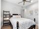 Cozy bedroom featuring nautical decor, soft lighting, and comfortable furnishings for a relaxing retreat at 7415 Paradiso Dr, Apollo Beach, FL 33572