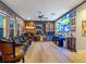 Entertaining space with a wet bar, custom wood accents and a large viewing screen at 7415 Paradiso Dr, Apollo Beach, FL 33572