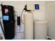 Utility room featuring a central vacuum system and Culligan water softener at 7415 Paradiso Dr, Apollo Beach, FL 33572