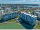 Enjoy city and water views from this condo complex with a pool, lush landscaping, and bay access at 7932 Sailboat Key S Blvd # 806, South Pasadena, FL 33707