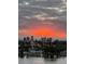 Stunning waterfront community view with serene waters and vivid sunset skies at 7932 Sailboat Key S Blvd # 806, South Pasadena, FL 33707