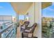 Cozy balcony with wicker chairs and stunning city views at 7932 Sailboat Key S Blvd # 806, South Pasadena, FL 33707