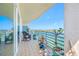 Open balcony with seating, plants, and amazing views of the water at 7932 Sailboat Key S Blvd # 806, South Pasadena, FL 33707