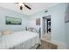 Comfortable bedroom with closet and doorway to laundry room at 7932 Sailboat Key S Blvd # 806, South Pasadena, FL 33707