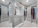 Spacious walk-in closet with custom shelving, ample storage, and well-organized hanging space at 7932 Sailboat Key S Blvd # 806, South Pasadena, FL 33707