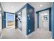 Hallway leading to outdoor balcony and doorway into bathroom at 7932 Sailboat Key S Blvd # 806, South Pasadena, FL 33707