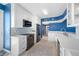 Renovated kitchen featuring white cabinets, stainless steel appliances and subway tile backsplash at 7932 Sailboat Key S Blvd # 806, South Pasadena, FL 33707