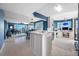 Open floor plan features a kitchen with a large island, updated appliances and a built in work from home space at 7932 Sailboat Key S Blvd # 806, South Pasadena, FL 33707