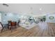 Bright and welcoming lounge area with ample seating, a piano, and serene decor at 7932 Sailboat Key S Blvd # 806, South Pasadena, FL 33707
