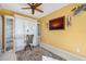 Office area featuring built in desk, ceiling fan, decorative lighting and beautiful flooring at 7932 Sailboat Key S Blvd # 806, South Pasadena, FL 33707