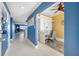Office area with built in desk, chair, ceiling fan and beautiful flooring at 7932 Sailboat Key S Blvd # 806, South Pasadena, FL 33707