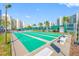 Enjoy a game of shuffleboard at this community with courts that feature benches and palm trees at 7932 Sailboat Key S Blvd # 806, South Pasadena, FL 33707