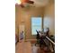 Cozy bedroom includes desk, a window for natural light and hardwood floors at 9613 Jasmine Brook Crk, Land O Lakes, FL 34638