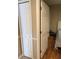 View into a light and airy bedroom featuring laminate wood floor and a closet at 9613 Jasmine Brook Crk, Land O Lakes, FL 34638