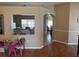 Open-concept living area features a seamless layout with hardwood floors at 9613 Jasmine Brook Crk, Land O Lakes, FL 34638