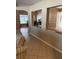 Open-concept living space with tile flooring, seamlessly connecting living room and dining area at 9613 Jasmine Brook Crk, Land O Lakes, FL 34638