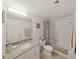 Bathroom featuring a bath tub and granite countertops at 9700 Starkey Rd # 321, Seminole, FL 33777
