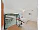 Neutral bedroom showcasing a bunk bed and one full bed at 9700 Starkey Rd # 321, Seminole, FL 33777