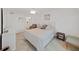 Well-lit main bedroom featuring a comfortable bed and neutral tones at 9700 Starkey Rd # 321, Seminole, FL 33777