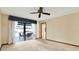 Bright bedroom with sliding glass doors to patio area at 10014 118Th Way, Seminole, FL 33772