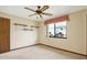 Bedroom with a ceiling fan, and wall shelving at 10014 118Th Way, Seminole, FL 33772