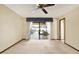 Bedroom featuring sliding glass doors to the patio and pool area at 10014 118Th Way, Seminole, FL 33772