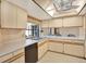 Well-lit kitchen with spacious countertops, ample storage, and modern appliances, perfect for culinary enthusiasts at 10014 118Th Way, Seminole, FL 33772