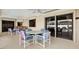Covered patio featuring multiple tables and chairs, great for outdoor entertainment at 10014 118Th Way, Seminole, FL 33772