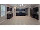 Bright, spacious kitchen boasts dark cabinetry, tile floors and modern appliances at 10240 Meadow Wren Ave, Weeki Wachee, FL 34613